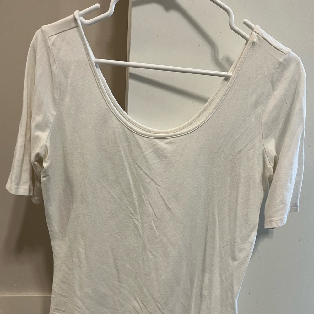 Quarter length sleeve white top